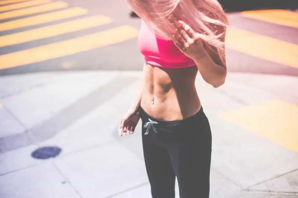 Woman with toned stomach after LA-EMS Body Sculpting Treatment Brighton and Hove